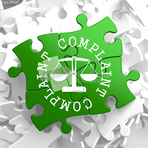 Image of Complaint Concept on Green Puzzle Pieces.