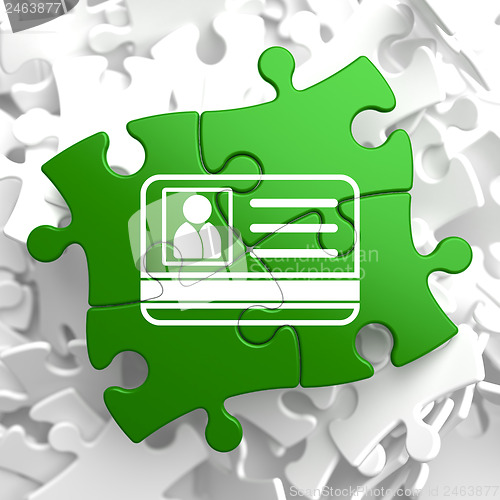 Image of ID Card Icon on Green Puzzle.