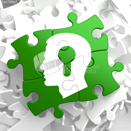 Image of Psychological Concept on Green Puzzle Pieces.