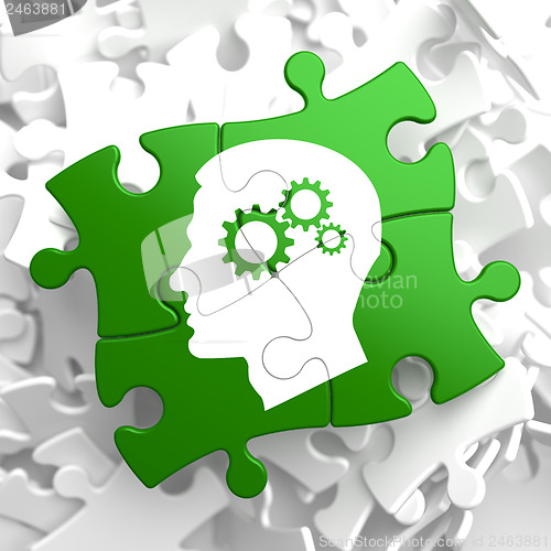 Image of Psychological Concept on Green Puzzle Pieces.
