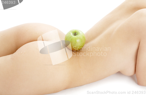 Image of naked woman torso with green apple #2