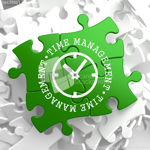 Image of Time Management Concept on Green Puzzle Pieces.