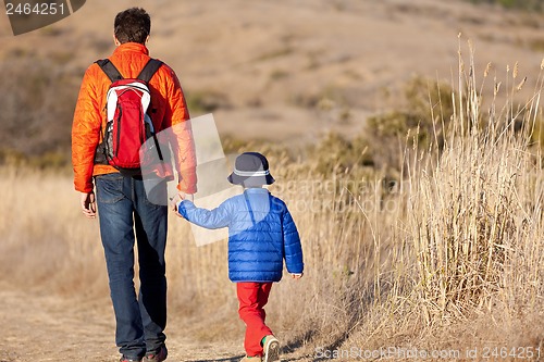 Image of family hiking