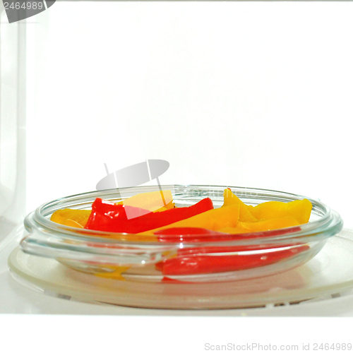 Image of Microwave with peppers