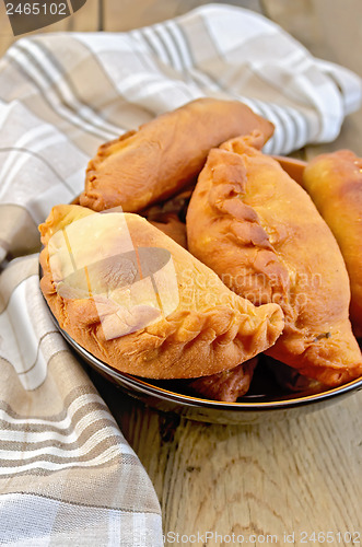 Image of Patties fried on a dish with a napkin