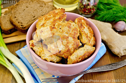 Image of Fritters chicken with bread on the board