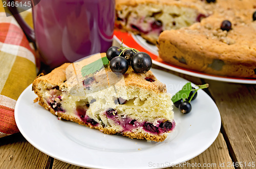 Image of Pie with black currant on the board