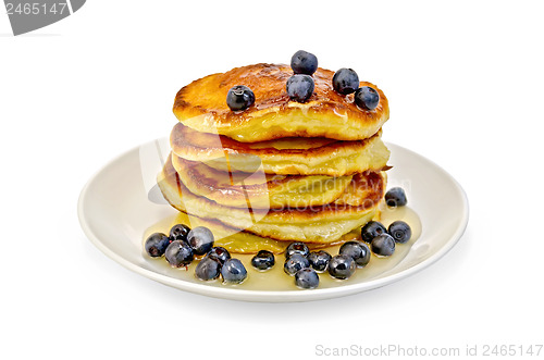 Image of Flapjacks with blueberries and honey