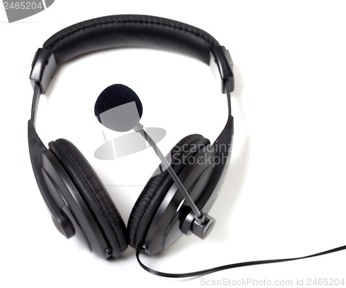 Image of Headphones with microphone on white background.