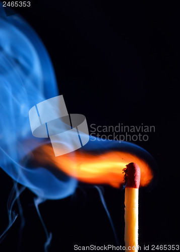 Image of burning match