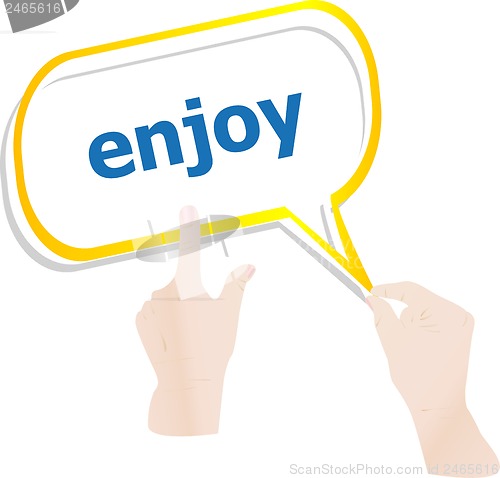 Image of hands push word enjoy on speech bubbles