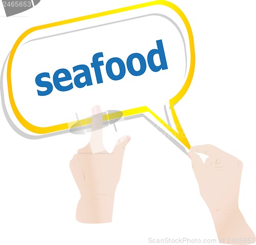 Image of hands push word seafood on speech bubbles