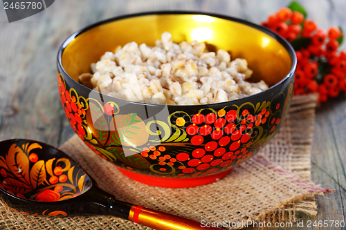 Image of Pearl barley porridge in a colorful bowl.