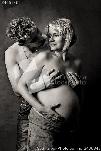 Image of Loving happy couple, pregnant woman with her husband