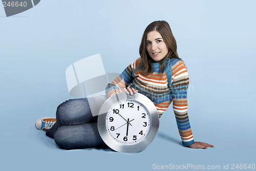 Image of Woman with a clock