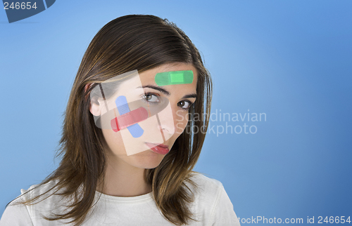 Image of Woman with a cross bandages