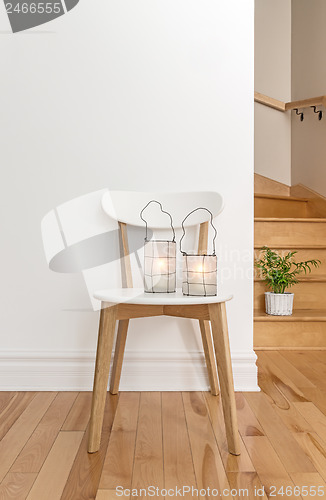 Image of Lanterns on a white chair