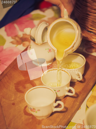 Image of Teapot Tea Flow In Cup, Tea Ceremony 