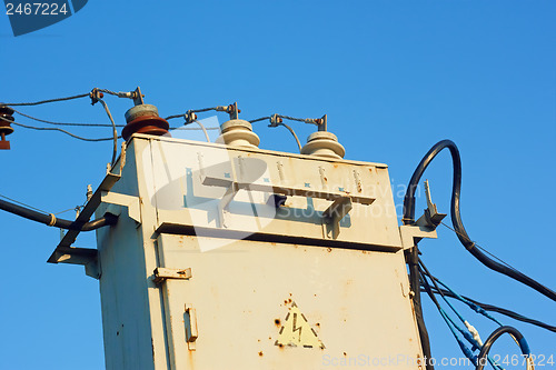 Image of Old transformer against blue sky
