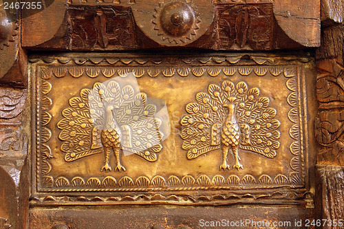 Image of indian metal ornament with peacocks