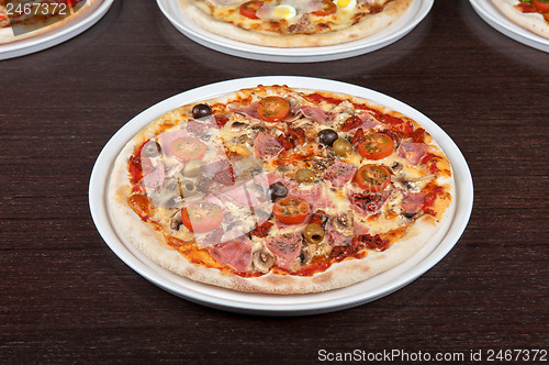 Image of pizza with ham and mushrooms