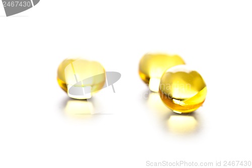 Image of thre yellow gelatin pills 