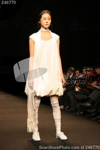 Image of Beautiful Asian fashion model on the catwalk during a fashion sh