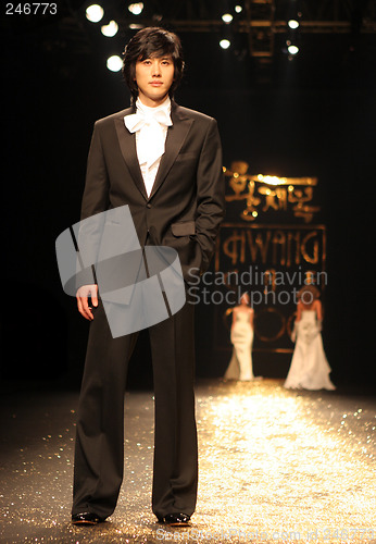 Image of Asian fashion model on the catwalk during a fashion show - EDITO