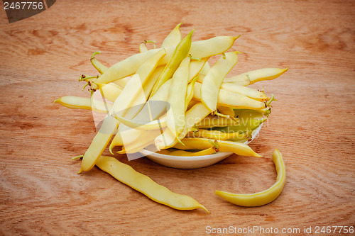 Image of Yellow Kidney Beans In A Bowl On Wooden Table