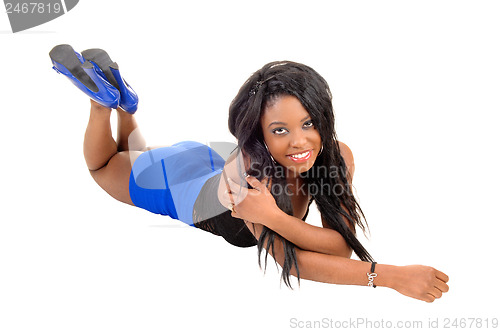 Image of Girl lying on floor.