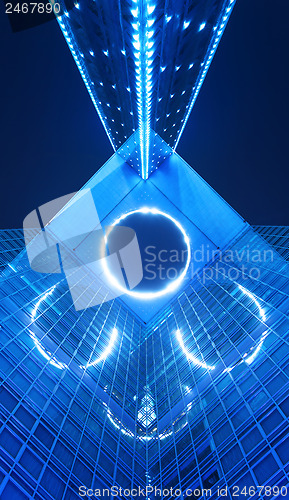 Image of office building at night in blue