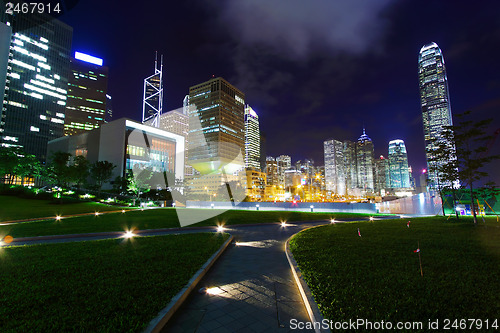 Image of modern office building in downtown city at night