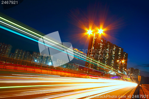 Image of modern city traffic at night 