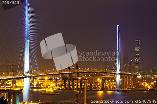 Image of Freeway in night with cars light in modern city 