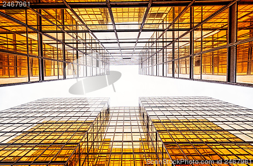 Image of modern blue glass wall of office building 