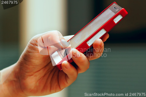 Image of Mobile phone in man hand 