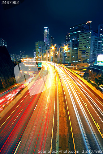 Image of Night traffic on a busy city highway