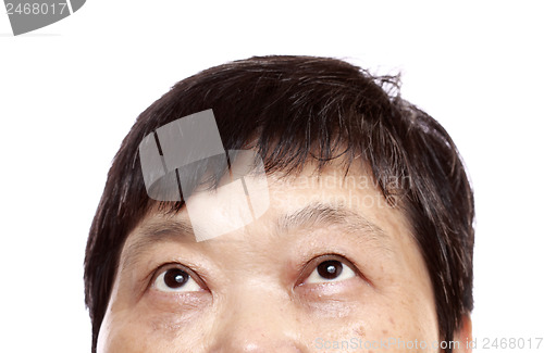 Image of Close-up of woman looking up. Isolated on white background. 