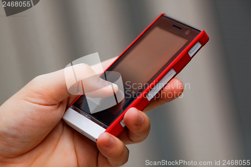 Image of Mobile phone in man hand 