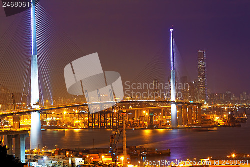 Image of Freeway in night with cars light in modern city 