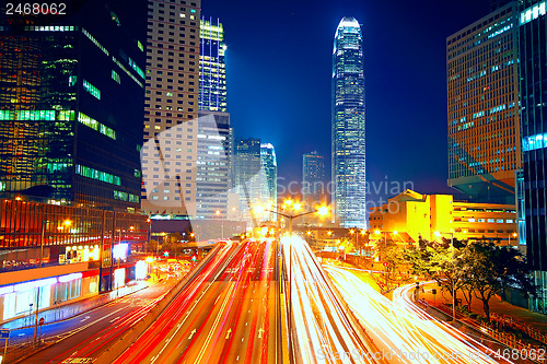 Image of Colorful city night with lights of cars motion blurred in hong k