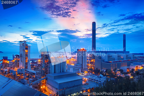 Image of coal power station and cement plant at night