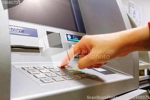 Image of Press cancel button on ATM keypad