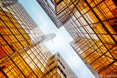 Image of modern blue glass wall of office building 