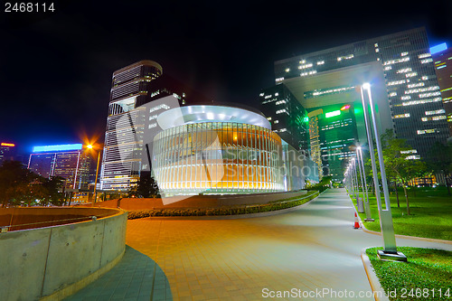 Image of modern office building in downtown city at night