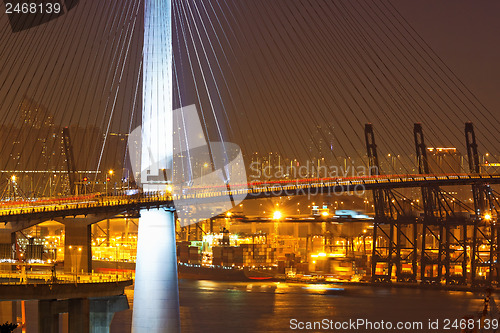 Image of Freeway in night with cars light in modern city 