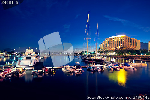 Image of large yachts in the golden coast at night 