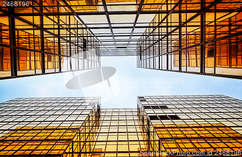 Image of modern blue glass wall of office building 