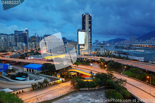 Image of highway bridge in city at cloudy night