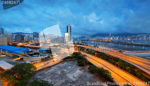 Image of highway bridge in city at cloudy night